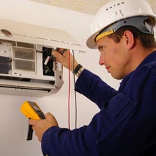 electrician working on AC